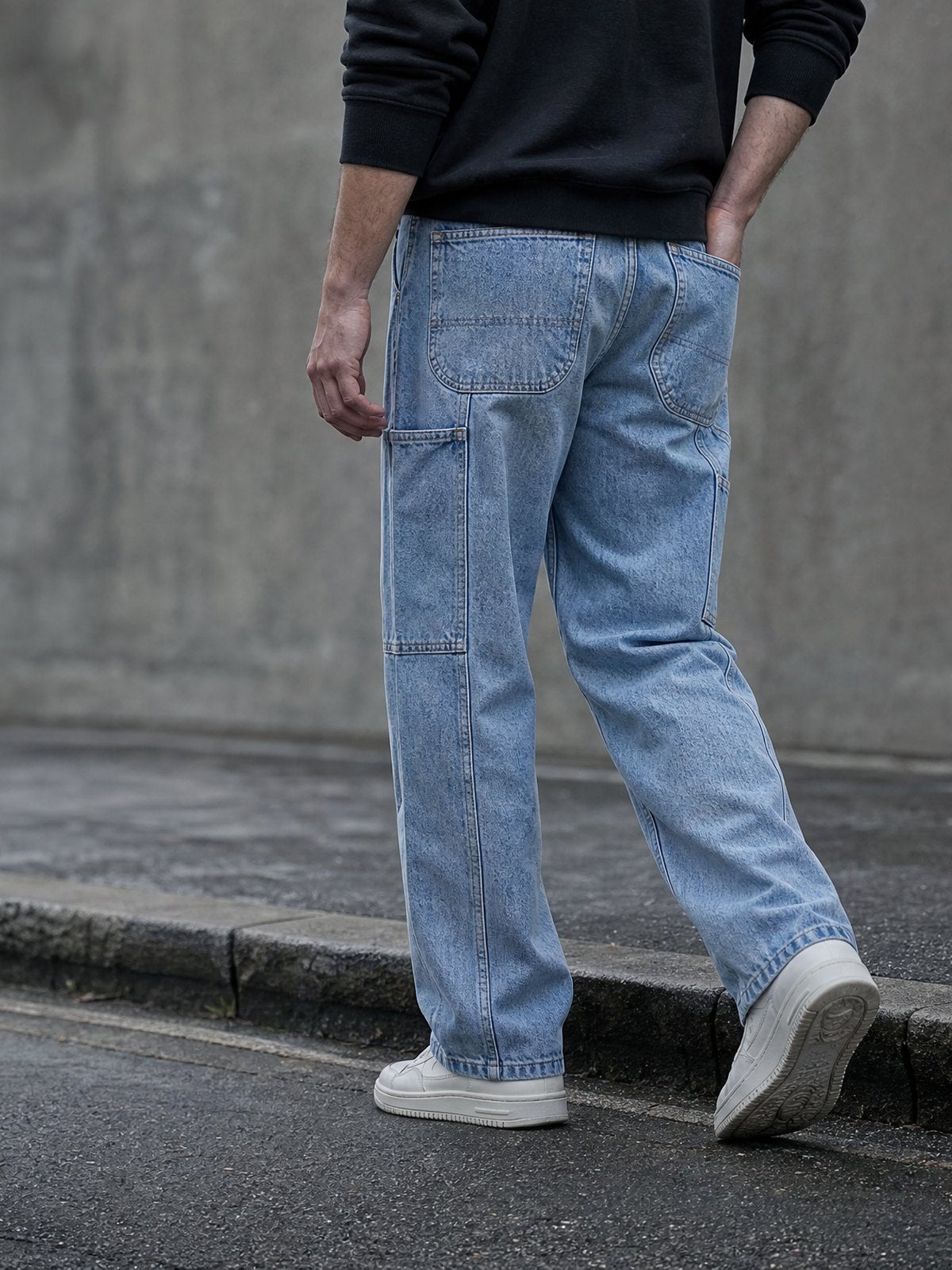 Light blue ROCQERX relaxed-fit denim jeans on a city street
